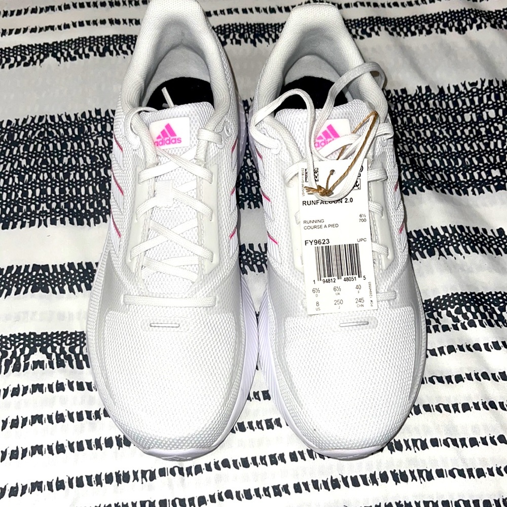Brand new adidas running shoe. NWT. Still in box.